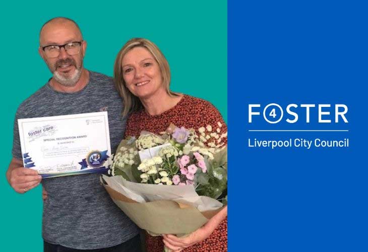 Foster carers holding certificate and bouquet of flowers alongside foster4 badge